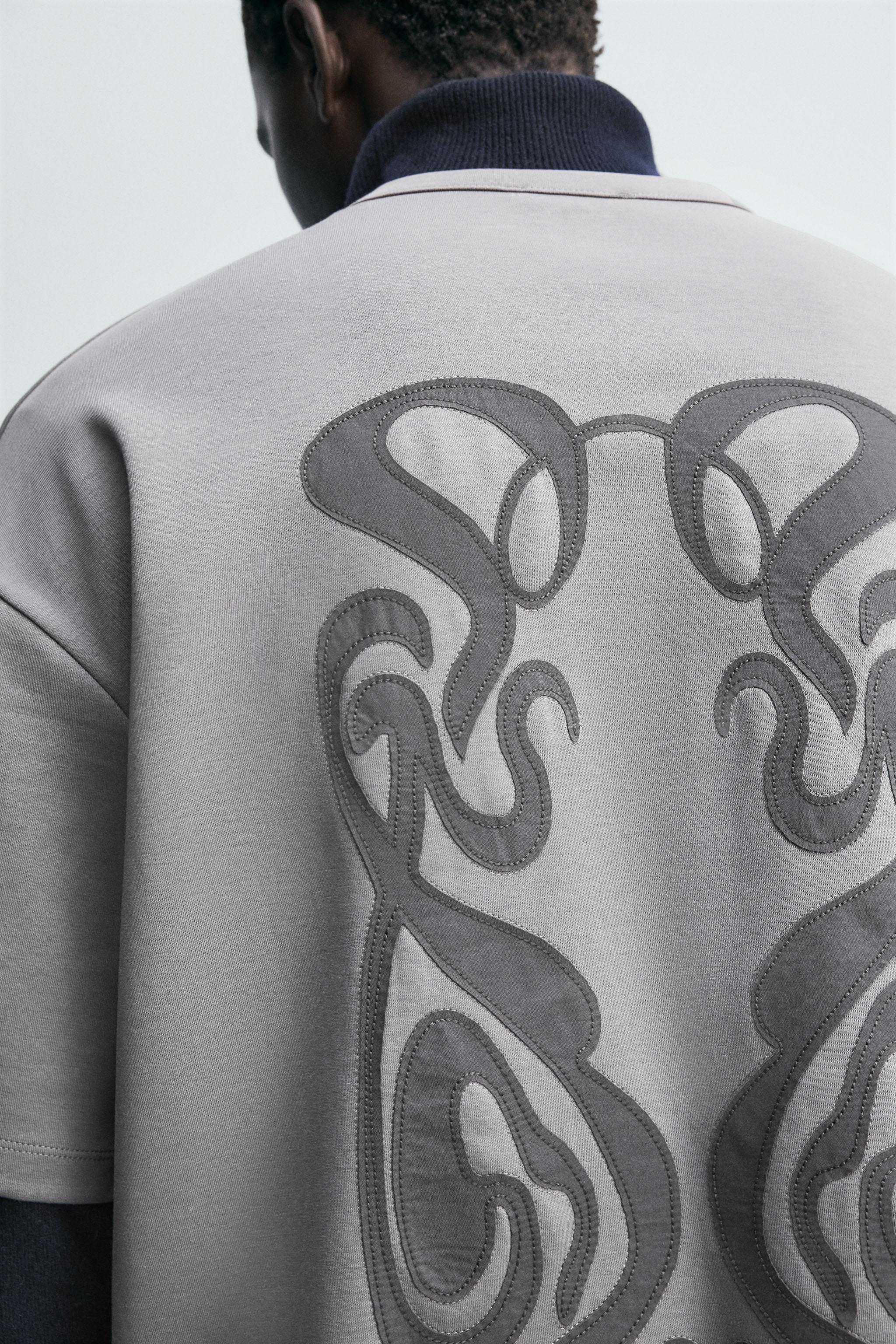 T-SHIRT À PIÈCE BIMATIÈRE